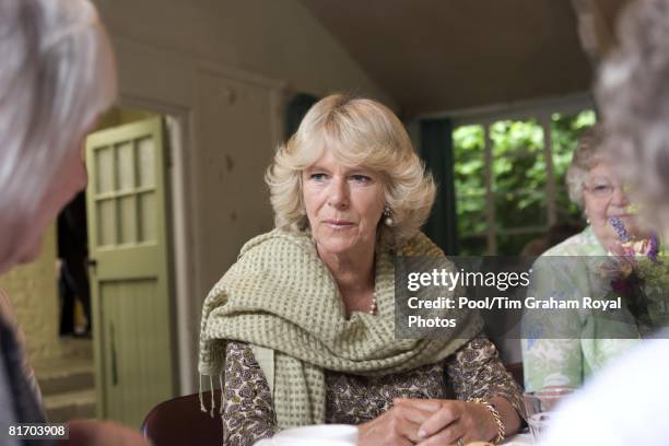 Camilla, Duchess of Cornwall, a member of the WI, meets members of the Myddfai Women's Institute at the village hall in Myddfai, near Llandovery on...