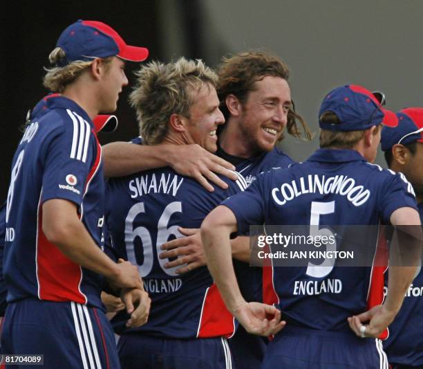 England's Graeme Swann celebrates with his team-mates taking the wicket of New Zealand's Jamie How during the fourth NatWest one-day International...