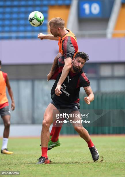 Olivier Giroud and Per Mertesacker of Arsenal during an Arsenal Training Session at Yuanshen Sports Centre Stadium on July 18, 2017 in Shanghai,...