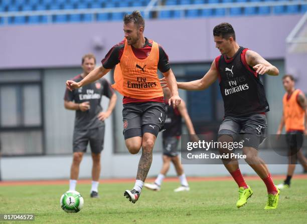 Aaron Ramsey and Granit Xhaka of Arsenal during an Arsenal Training Session at Yuanshen Sports Centre Stadium on July 18, 2017 in Shanghai, China.