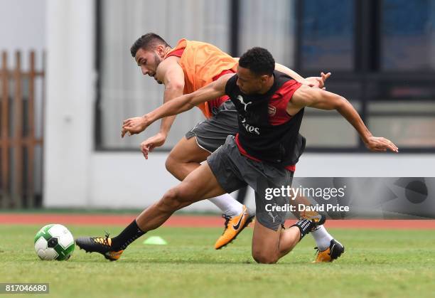 Sead Kolasinac and Francis Coquelin of Arsenal during an Arsenal Training Session at Yuanshen Sports Centre Stadium on July 18, 2017 in Shanghai,...