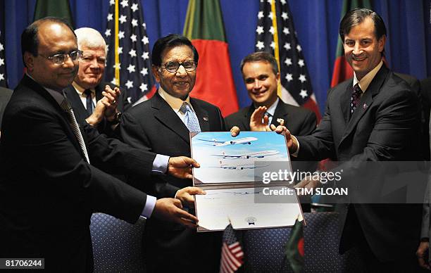 Dr. M.A. Momen, CEO of Biman Bangladesh Airlines, Mahbub Jamil Chairman of the BBA Board of Directors and Marty Bentrott, Senior VP of Sales, Boeing...