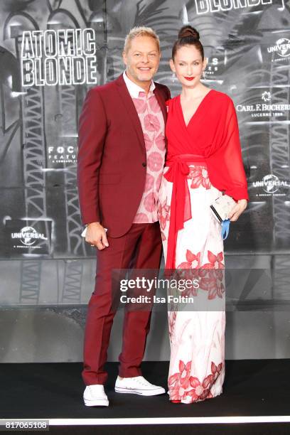 Model Christin Dechant and musician Uwe Fahrenkrog-Petersen attend the 'Atomic Blonde' World Premiere at Stage Theater on July 17, 2017 in Berlin,...