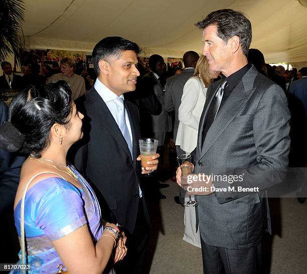 Pierce Brosnan attends the dinner in honour of Nelson Mandela, celebrating his 90th birthday, at Hyde Park on June 25, 2008 in London, England. The...