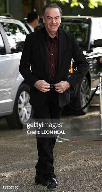 Singer Neil Diamond arrives at Nelson Mandela's birthday dinner in Hyde park, in London, on June 25, 2008. With a concert to celebrate his 90th...