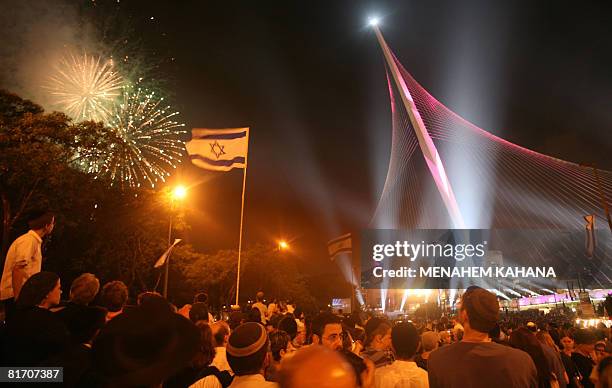 Israelis participate in the inauguration ceremony of the 'Chords Bridge' , designed by Spanish architect Santiago Calatrava, at the main entrance of...