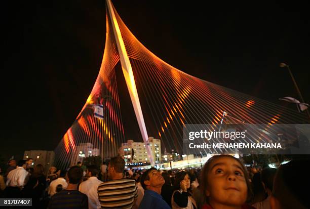 Israelis attend the inauguration ceremony of the 'Chords Bridge' , designed by Spanish architect Santiago Calatrava, at the main entrance of...