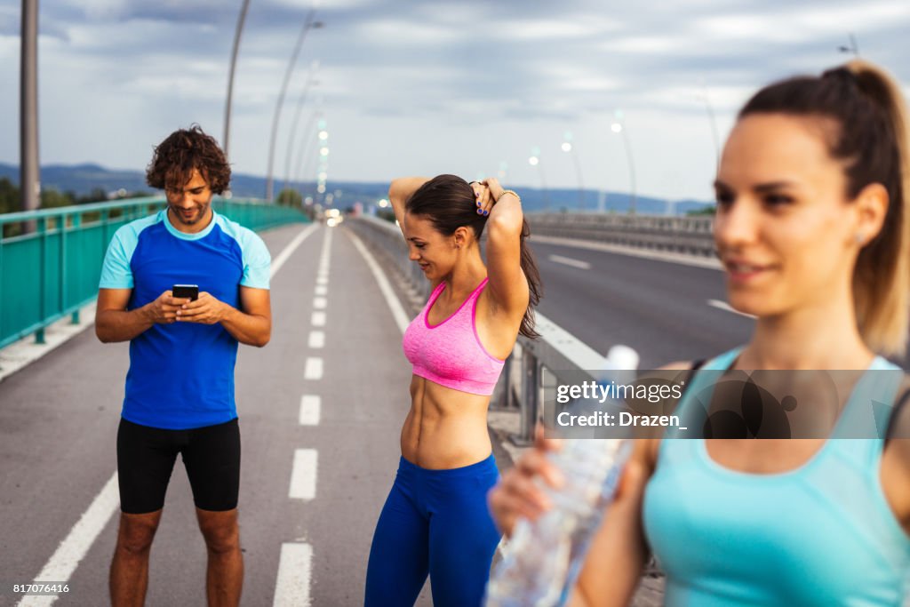 Man using mobile app to track running route and distance