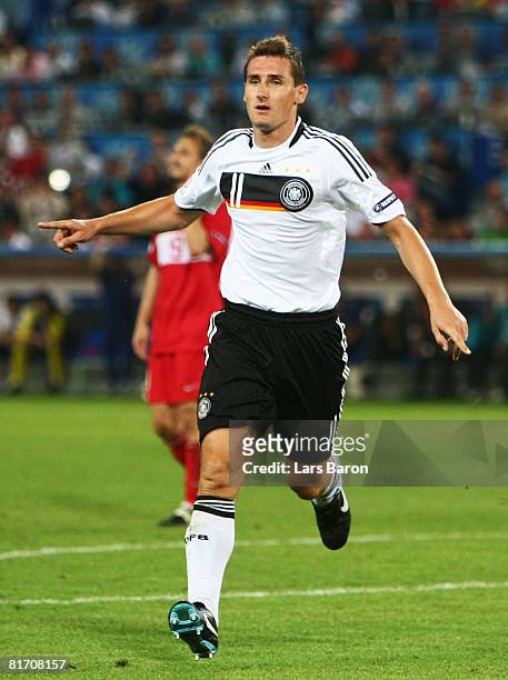 Miroslav Klose of Germany celebrates his goal against Turkey during the UEFA EURO 2008 Semi Final match between Germany and Turkey at St. Jakob-Park...