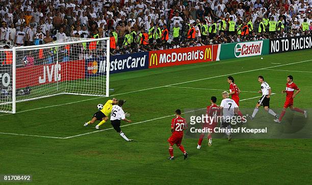 Philipp Lahm of Germany scores his team's third goal against Turkey during the UEFA EURO 2008 Semi Final match between Germany and Turkey at St....