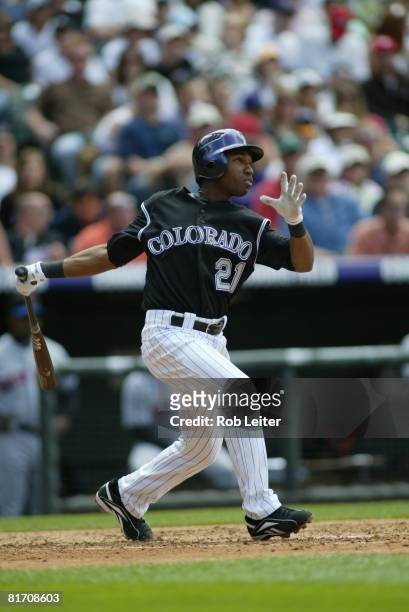 Jonathan Herrera of the Colorado Rockies hits during the game against the New York Mets at Coors Field in Denver, Colorado on May 24, 2008. The Mets...
