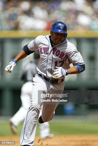 Fernando Tatis of the New York Mets runs towards third base during the game against the Colorado Rockies at Coors Field in Denver, Colorado on May...