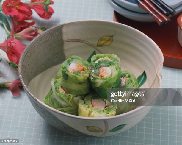 rolled up cabbage with crab stick - crab stick stock pictures, royalty-free photos & images
