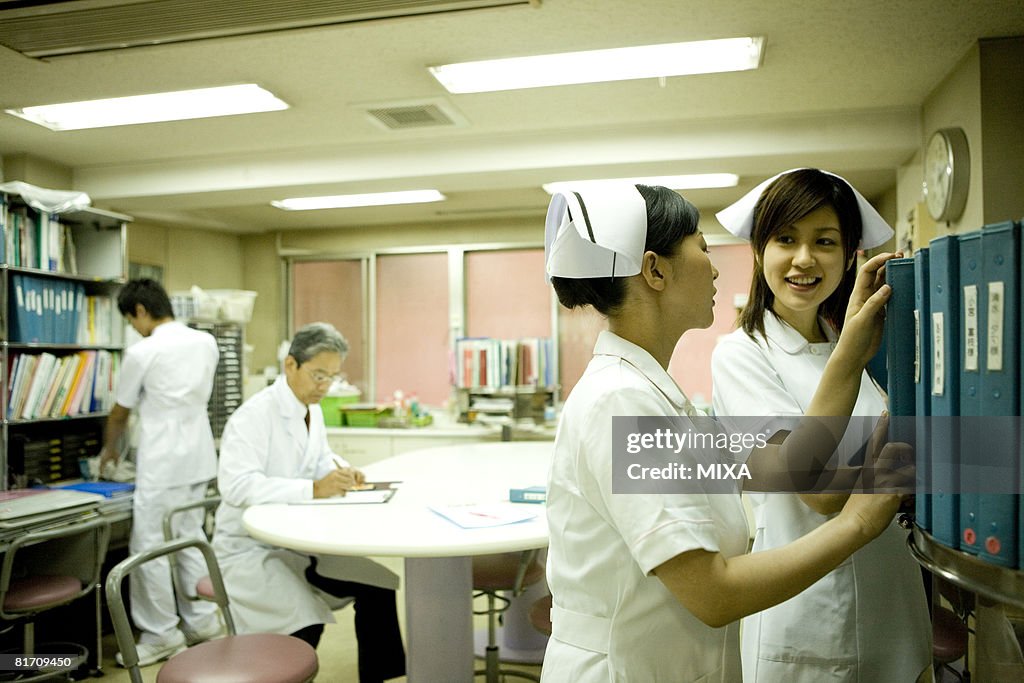 Doctor sand nurses working in nurses station