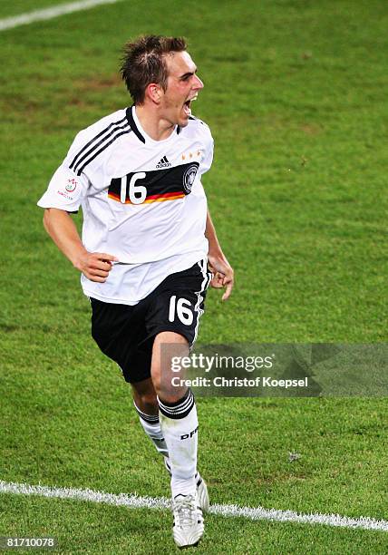 Philipp Lahm of Germany celebrates after scoring his team's third goal against Turkey during the UEFA EURO 2008 Semi Final match between Germany and...