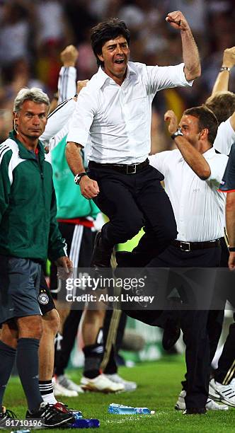 Joachim Loew coach of Germany celebrates during the UEFA EURO 2008 Semi Final match between Germany and Turkey at St. Jakob-Park on June 25, 2008 in...