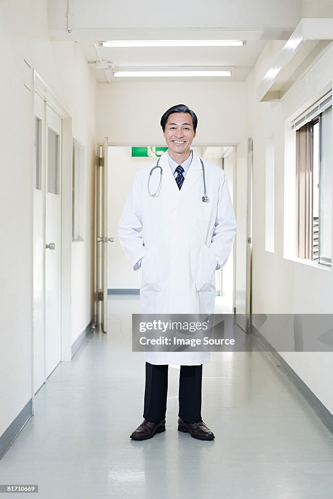 Doctor in hospital corridor