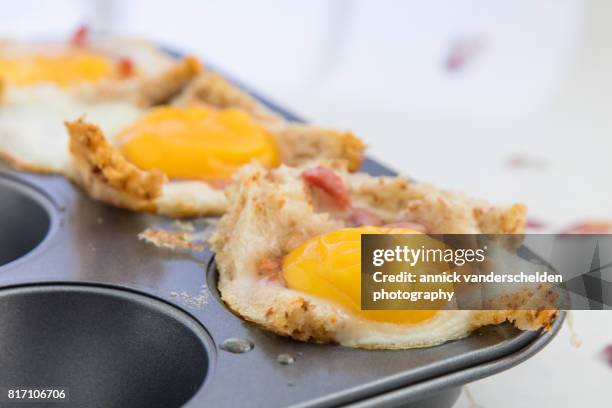 breakfast quiche with bread, lardons and egg. - muffin tin stock pictures, royalty-free photos & images