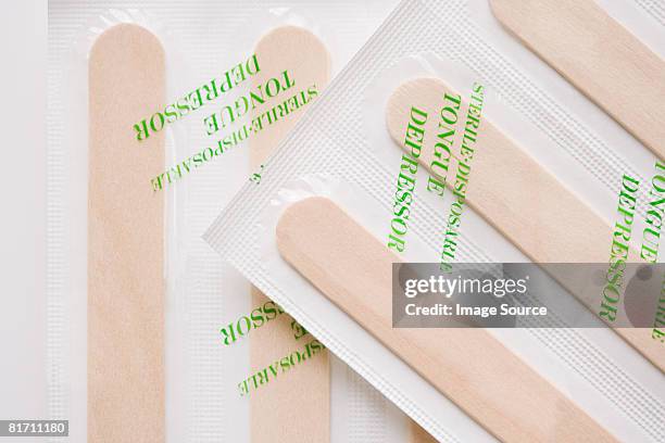 tongue depressors - tongue depressor stock pictures, royalty-free photos & images