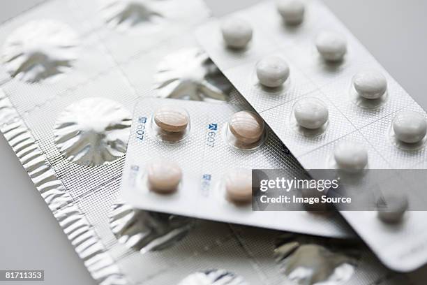 pills in packets - sachet stock pictures, royalty-free photos & images