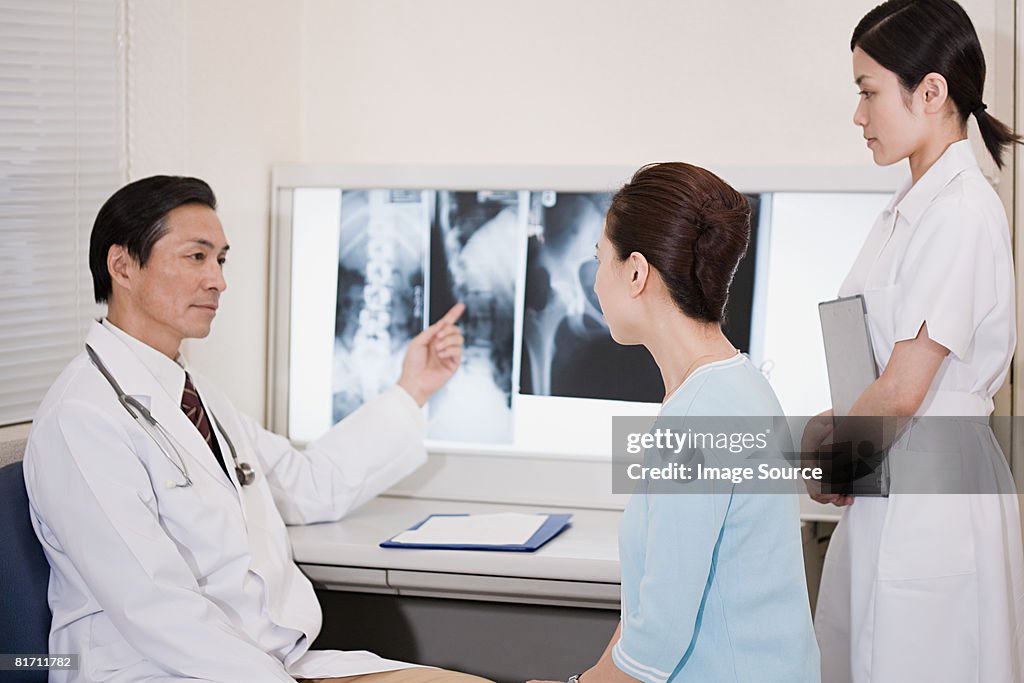 Doctor and patient with x rays