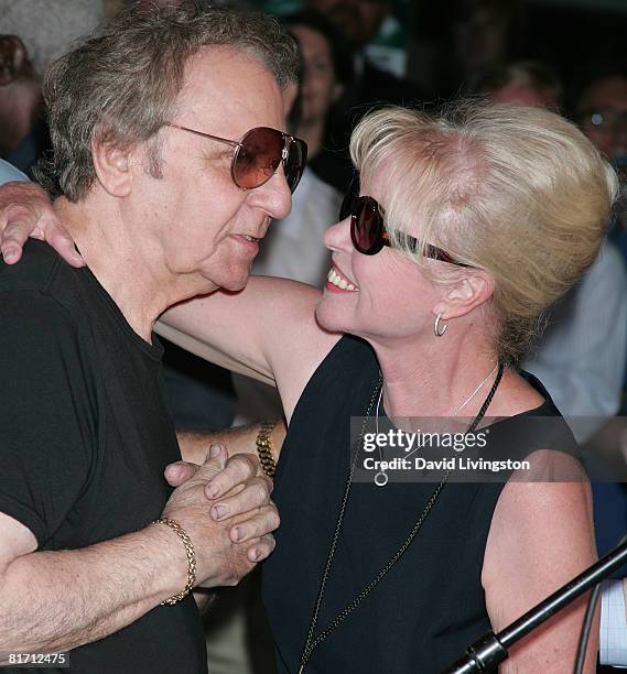 Musician Hal Blaine and Michelle Phillips attend The Wreaking Crew's induction into Hollywood's RockWalk at the Guitar Center on June 25, 2008 in...