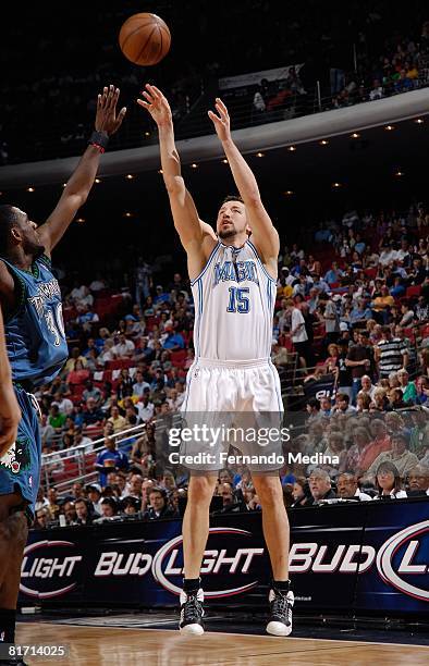 Hedo Turkoglu of the Orlando Magic takes a jump shot under pressure against Kirk Snyder of the Minnesota Timberwolves during the game on April 11,...