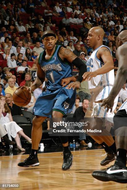 Rashad McCants of the Minnesota Timberwolves looks to maneuver against Keith Bogans of the Orlando Magic during the game on April 11, 2008 at Amway...