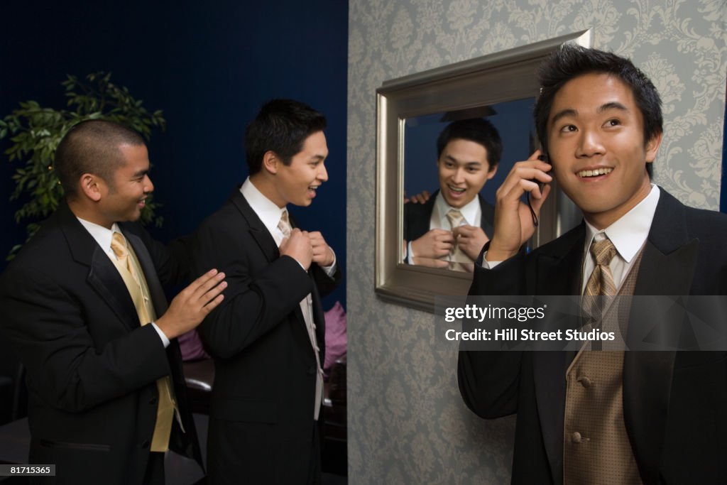 Multi-ethnic men wearing suits