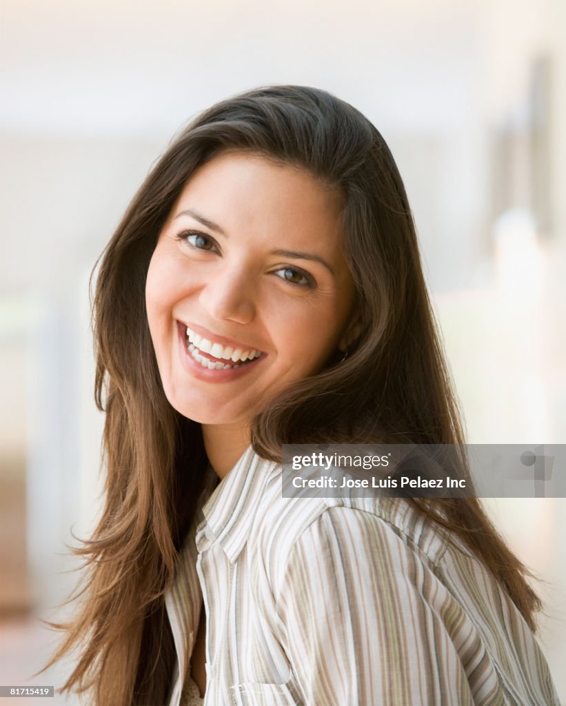 Hispanic woman laughing