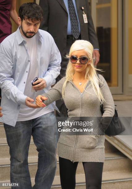 Christina Aguilera and husband Jordan Bratman leaving CNN studios on June 25, 2008 in Hollywood, California.