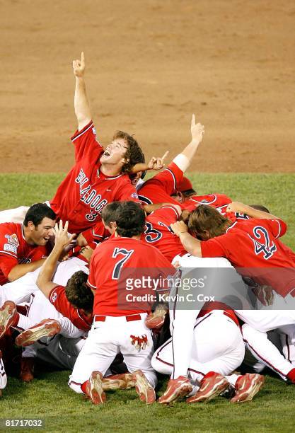 Erik Wetzel and the Fresno State Bulldogs celebrate a 6-1 win over the Georgia Bulldogs in Game 3 of the 2008 Men's College World Series Championship...