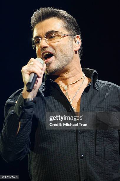 George Mic Singer George Michael performs onstage during the 2008