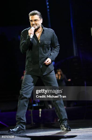 George Mic Singer George Michael performs onstage during the 2008