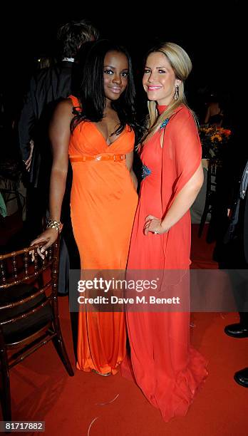 Heidi Range and Keisha Buchanan attend the dinner in honour of Nelson Mandela, celebrating his 90th birthday, at Hyde Park on June 25, 2008 in...