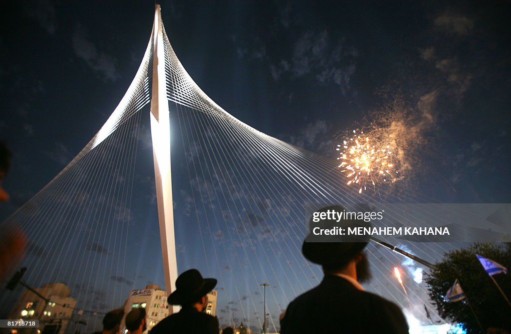 Ultra-Orthodox Jews watch fireworks duri
