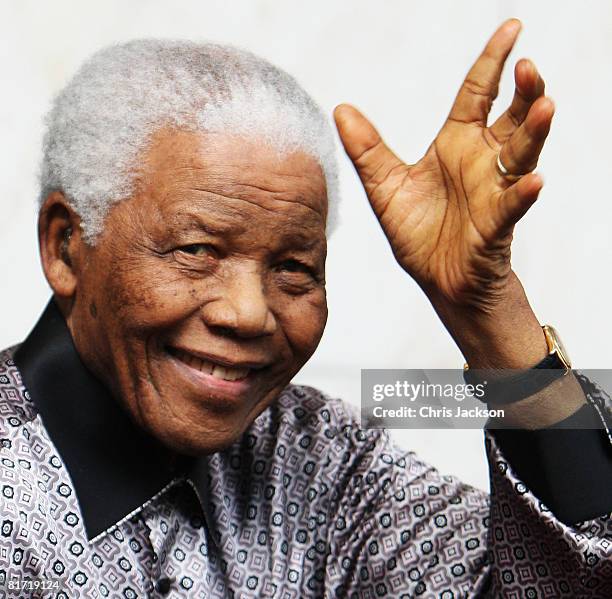 Nelson Mandela leaves the InterContinental Hotel after a photoshoot with celebrity photographer Terry O'Neil on June 26, 2008 in London, England....