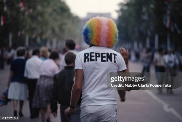 Rollen "Rainbow Man" Stewart walks on The Mall in London during the wedding of Prince Charles and Lady Diana Spencer on July 29, 1981. Stewart was...