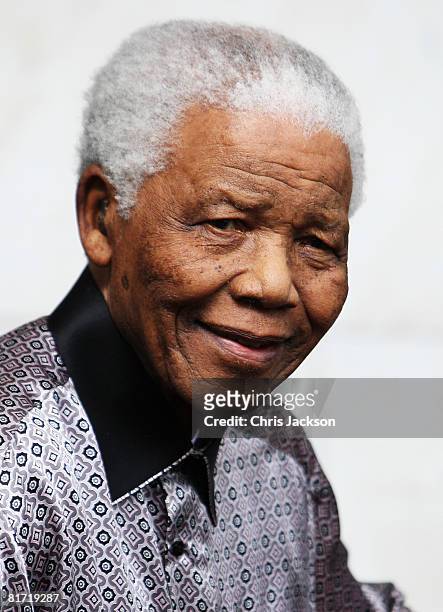 Nelson Mandela leaves the InterContinental Hotel after a photoshoot with celebrity photographer Terry O'Neil on June 26, 2008 in London, England....