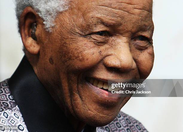 Nelson Mandela leaves the InterContinental Hotel after a photoshoot with celebrity photographer Terry O'Neil on June 26, 2008 in London, England....