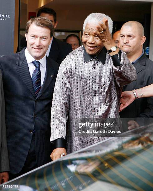 Nelson Mandela and Roland Fasel , General Manager of the The InterContinental Hotel Park Lane, arriving at The InterContinental Hotel Park Lane,...