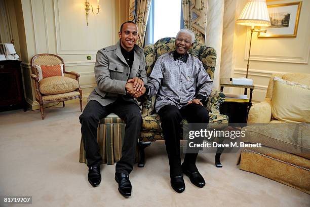 Lewis Hamilton meets with Nelson Mandela ahead of the 46664 concert being held in Hyde Park on Friday the 27th of June, at the Dorchester Hotel on...