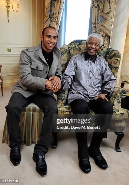 Lewis Hamilton meets with Nelson Mandela ahead of the 46664 concert being held in Hyde Park on Friday the 27th of June, at the Dorchester Hotel on...