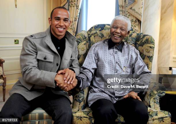 Lewis Hamilton meets with Nelson Mandela ahead of the 46664 concert being held in Hyde Park on Friday the 27th of June, at the Dorchester Hotel on...