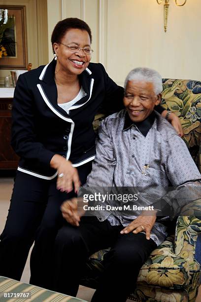 Nelson Mandela and his wife Graca Machel pose ahead of the 46664 concert being held in Hyde Park on Friday the 27th of June in his honour, at the...