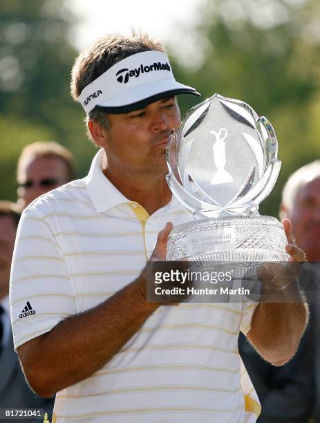 Kenny Perry kisses the championship trophy after winning the final round of the Memorial Tournament at Muirfield Village Golf Club on June 1, 2008 in...