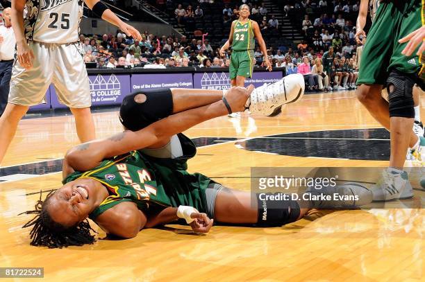 Yolanda Griffith of the Seattle Storm reacts to an ankle injury during the WNBA game against the San Antonio Silver Stars on June 13, 2008 at the...
