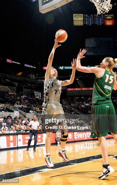 Erin Buescher of the San Antonio Silver Stars puts up a shot against Lauren Jackson of the Seattle Storm during the WNBA game on June 13, 2008 at the...