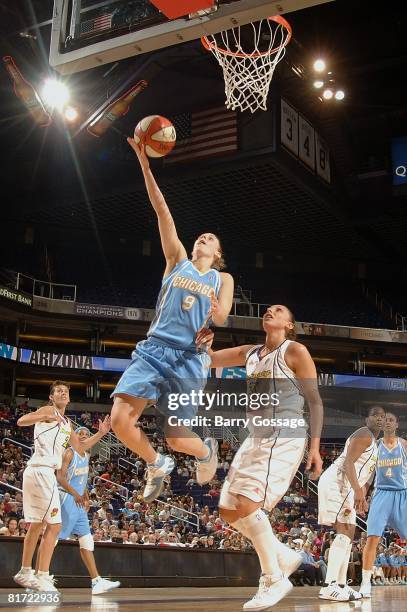 Cathy Joens of the Chicago Sky lays up a shot against Diana Taurasi of the Phoenix Mercury during the WNBA game on June 20, 2008 at US Airways Center...