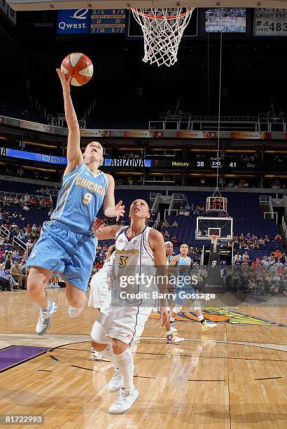 Cathy Joens of the Chicago Sky lays up a shot against Diana Taurasi of the Phoenix Mercury during the WNBA game on June 20, 2008 at US Airways Center...